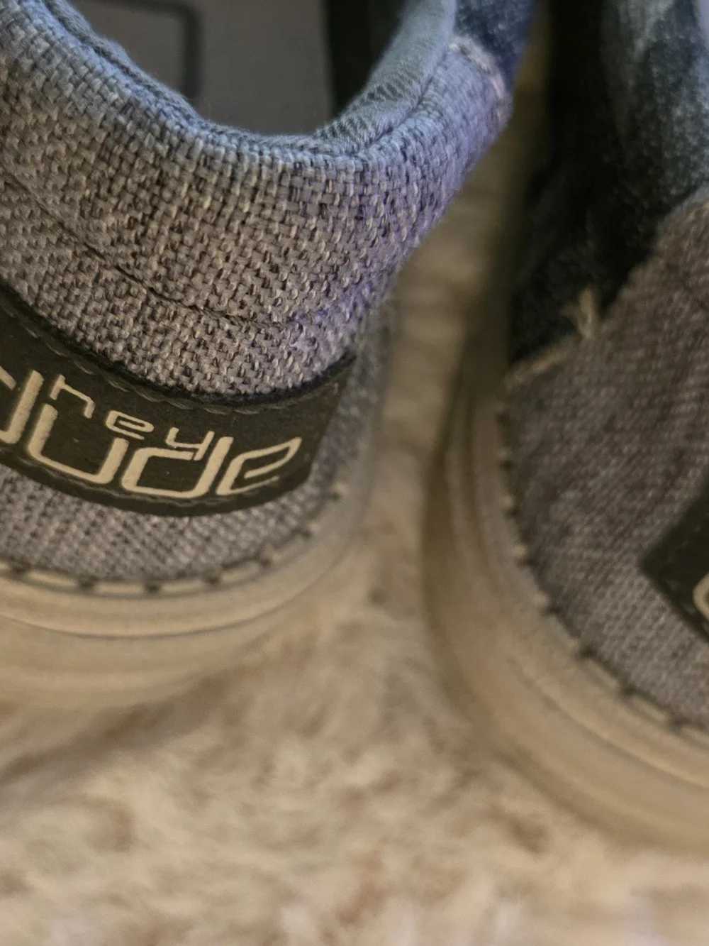 Hey Dude Kids Slip-On Sneakers in Black and Gray